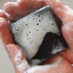 Moisturising soap with activated charcoal powder